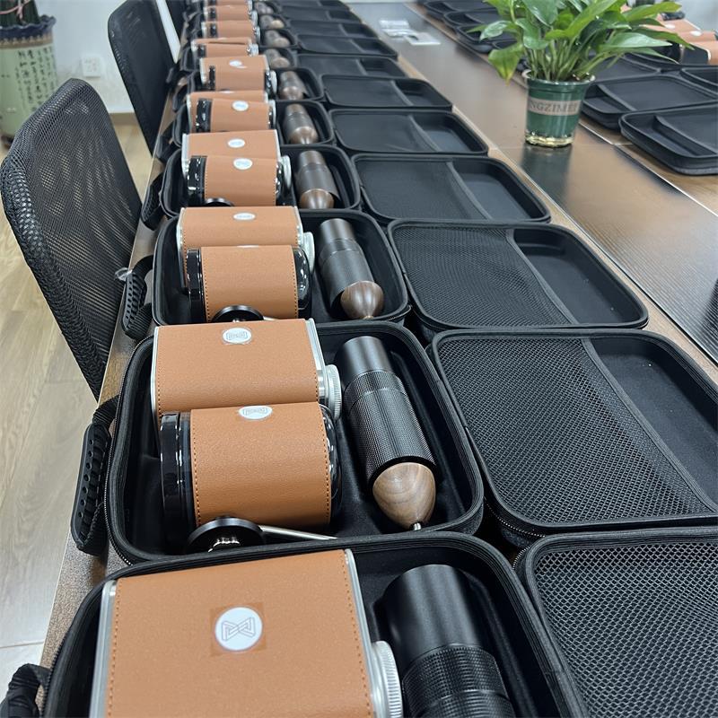 Hand brewed coffee set including; filter cup, sharing pot, and grinder
