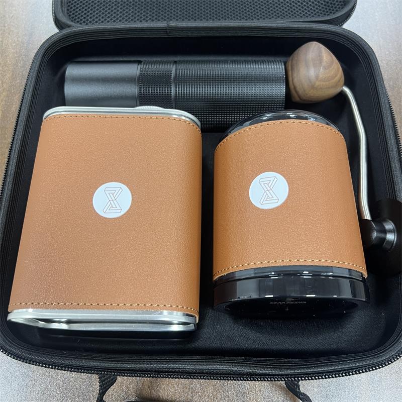 Hand brewed coffee set including; filter cup, sharing pot, and grinder